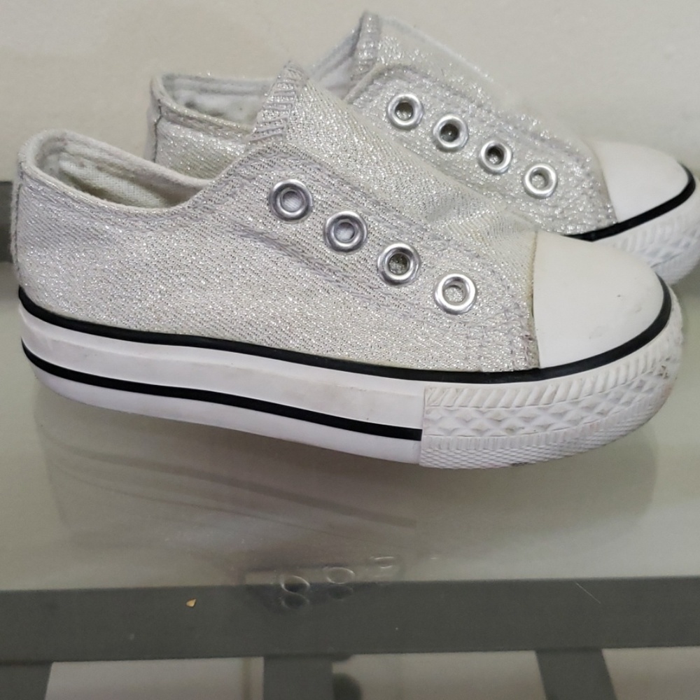 Shimmery silver canvas slip ons